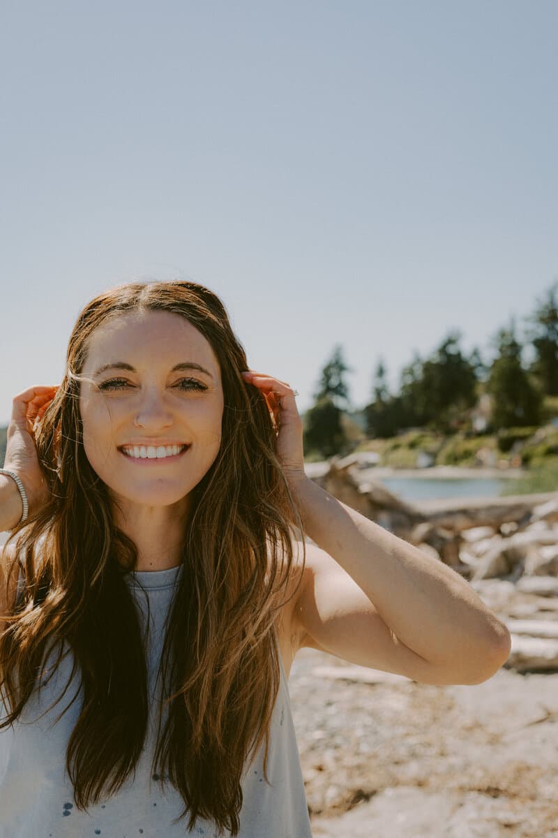 Dr. Katrina Sudduth smiling on a Kitsap beach
